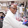 Medical lab specialist working at his desk